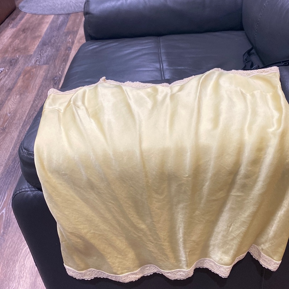 Camisole size 10, yellow trimmed in cream